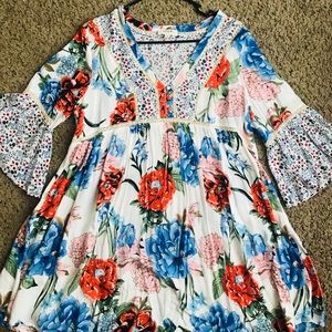 Beautiful floral print tunic. Only worn once.
